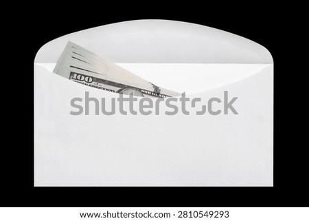 Open white envelope containing hundred dollar banknotes, isolated on black background