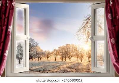 Open window looking out to frosty sunrise through trees and fields in winter. Beautiful sky and clouds - Powered by Shutterstock