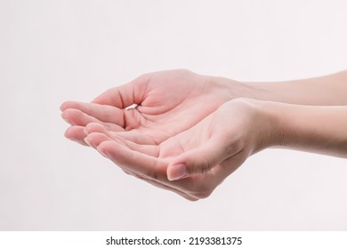 Open a woman's hand, palm up isolated on white background. - Shutterstock ID 2193381375