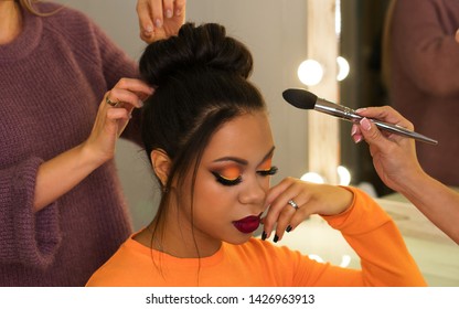Open workshop hairdressing. Master class makeup art shows on model. Fashion professional. Practice skills obtained at vocational training centre. Vlogger  makeup tutorial channel. Concept of study. 