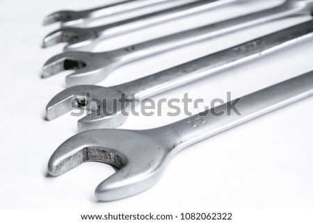 open wrenches closeup on white background
