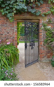 Open Wrought Iron Gate To Garden