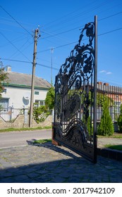 open wrought iron gate,open large gates beautiful decorated with wrought iron products