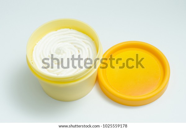 Download Open Yellow Cream Jar White Lotion Objects Stock Image 1025559178 PSD Mockup Templates