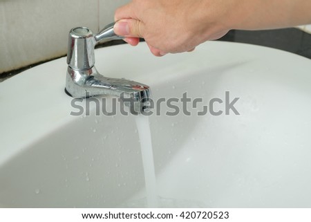 Open/close the water tap
