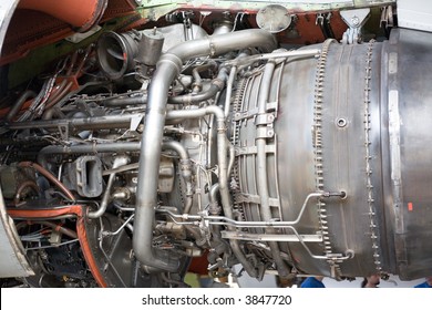 opened aircraft engine in the hangar
