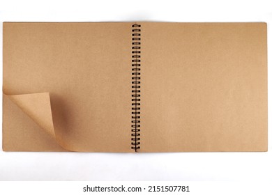 Opened album with sepia flipped pages and metal binding isolated on white background. - Shutterstock ID 2151507781