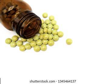An opened bottle of green tablets of chlordiazepoxide and clindinium bromide. Chlordiazepoxide is a benzodiazepine, sedative and antianxiolytic. Clidinium bromide decreases intestinal spasms