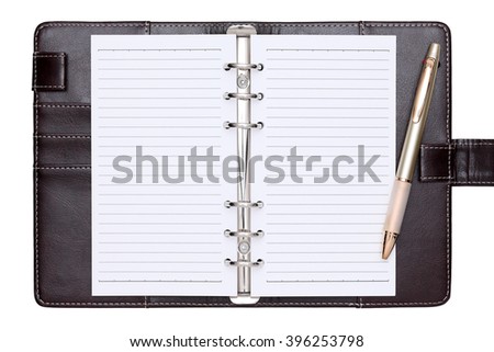 opened brown leather notebook and ballpoint pen isolated on white background 