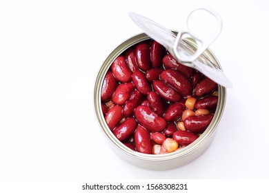 Opened Canned Kidney Beans With Corn. Isolated On A White