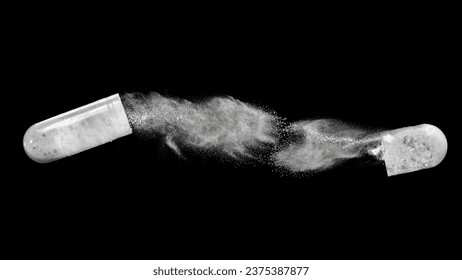 Opened capsule pill pellets explosion on black background - Powered by Shutterstock - Get 15% off with code: PIKWIZARD15