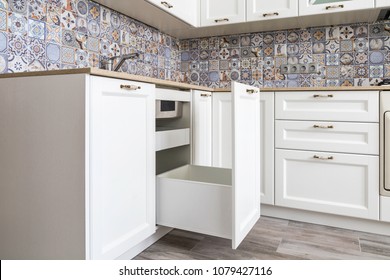 Opened Drawer With High Front Under A Sink, Large Drawer For A Garbage Bin, Inner Drawer For Garbage Bags Storage And Small Detergents. Clever Solution For Kitchen Storage And Organization. 