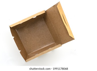 Opened Eco Takeaway Food Box On White Background. Empty Brown Paper Food Box With Waterproof Coating Inside. Top View Image.