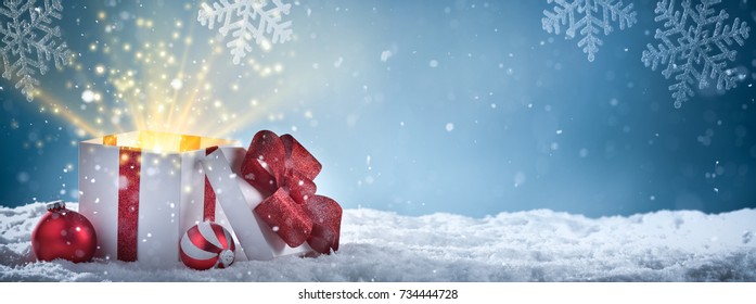 Opened gift box with magic light - Powered by Shutterstock