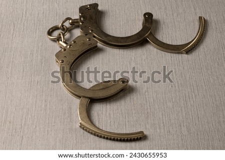 Opened handcuffs on a table