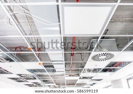 Opened hung ceiling at construction site