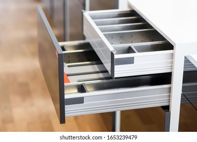 Opened Kitchen Drawer With Cutlery Tray. Two Drawers Are Hide Behind The High Front. Smart Storage Solution.