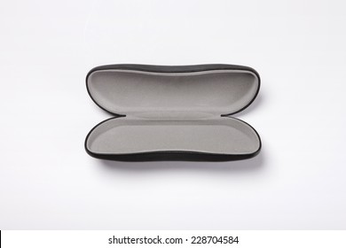 A opened leather eye wear(glasses) case isolated white, top view.