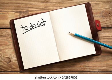 Opened personal organizer with a to do list. - Shutterstock ID 142959802