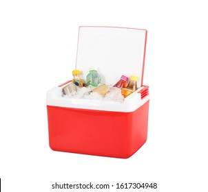Opened red cooling box with bottles of beverage and ice isolated on white background