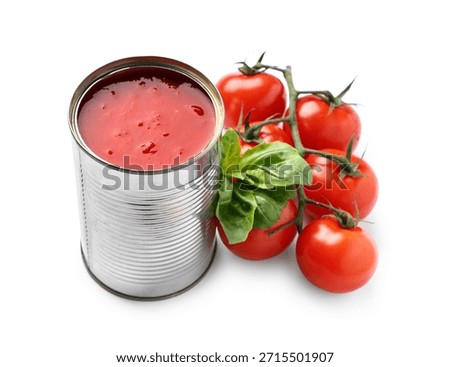Opened tin can with tomato paste and ingredients isolated on white background, closeup