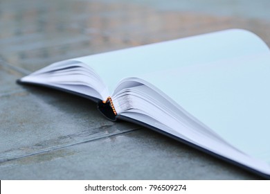 Opened white book