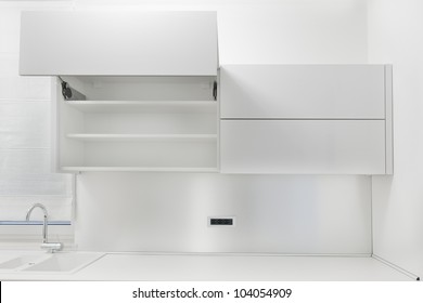 Opened White Kitchen Cabinet