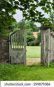 Opened wooden gate in park