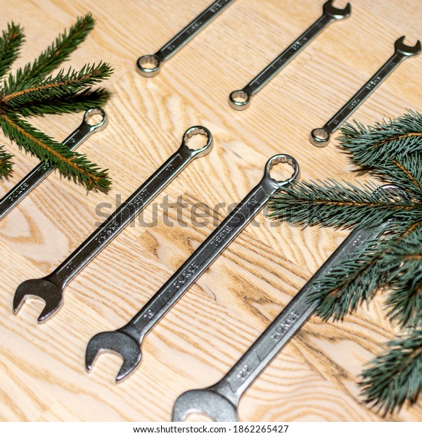 Open-end\
wrenches and wrenches set with fir\
branches