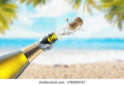 Opening a bottle of champagne on the sea beach - Powered by Shutterstock