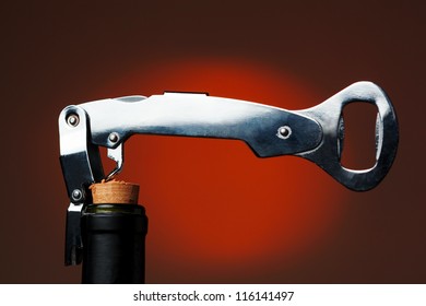 Opening Of Bottle Of Wine With Corkscrew