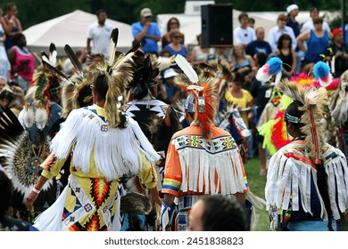 Opening ceremonies annual Pow Wow powwow. Indigenous Native American First Nations cultural event. Heritage, pride, culture, history, tradition, traditional. Regalia beadwork feathers headdress. Dance