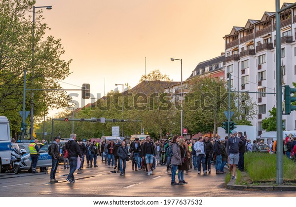 Opening\
ceremony of the lateral thinkers for the Whitsun weekend in Berlin\
on May 22nd, 21st. Participants of the car parade celebrate the\
opening, which leads to arrests by the\
police.