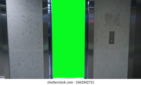 Opening Doors In Elevator With Green Screen. Elevator In Office Building