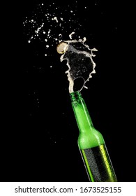 Opening Green Beer Bottle And Splash On Black Background