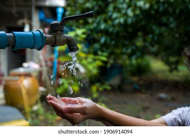 Opening tap water, water shortage concept, water reservation concept