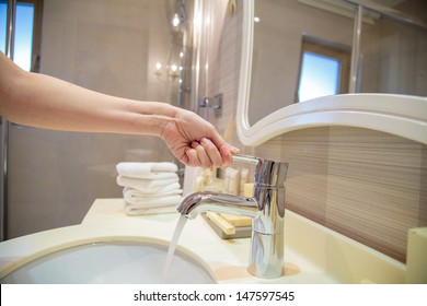 opening a water tap