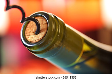 Opening A Wine Bottle With A Cork Screw In A Restaurant