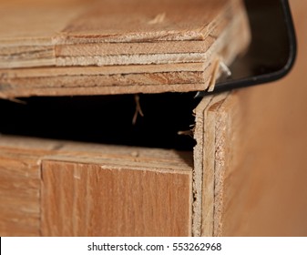 Opening Wooden Crate With Crowbar