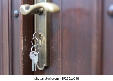 
Opening a wooden door with a gold key