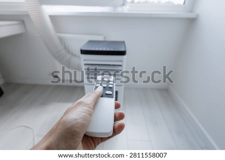 Operating smart mobile monoblock air conditioner unit via wireless infrared remote control transmitter