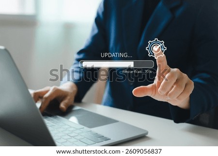 Operating system upgrade concept, installation app and software update process, modernize user equipment, update modern functions, developer released new version Improved security. User is downloading