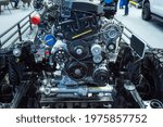 Operation of the engine in the engine compartment of the car