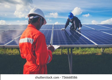 operation and maintenance in solar power plant ; engineer working on checking and maintenance in solar power plant ,solar power plant to innovation of green energy for life
