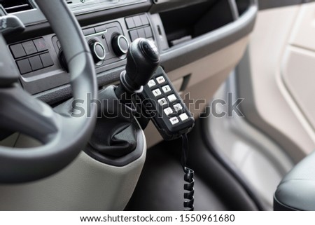 operational machine. near the backside device to turn on the flashing lights on the car