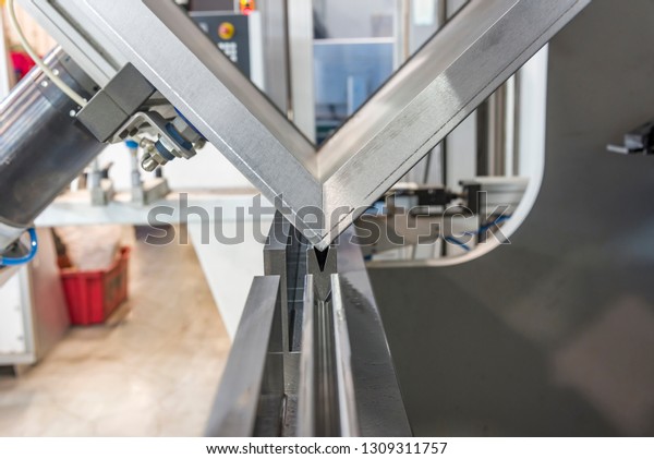 operator bending metal sheet by sheet bending\
machine sheet bending\
machines