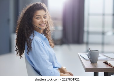 the operator enjoys fragrant coffee, taking a short break from work - Powered by Shutterstock