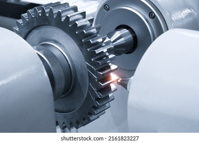 Operator inspection dimension metal gear parts by CMM after machining process in industrial factory. - Shutterstock ID 2161823227