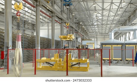 The operator lifting device timelapse, lift loads using lifting magnet, mechanical workshop, concrete and metal structures plant. Reinforced concrete Factory modern workshop - Powered by Shutterstock