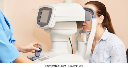 ophthalmologist doctor in exam optician laboratory with female patient. Eye care medical diagnostic. Eyelid treatment